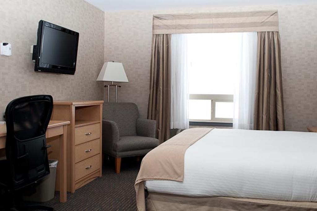 Paradise Inn And Suites Valleyview الغرفة الصورة